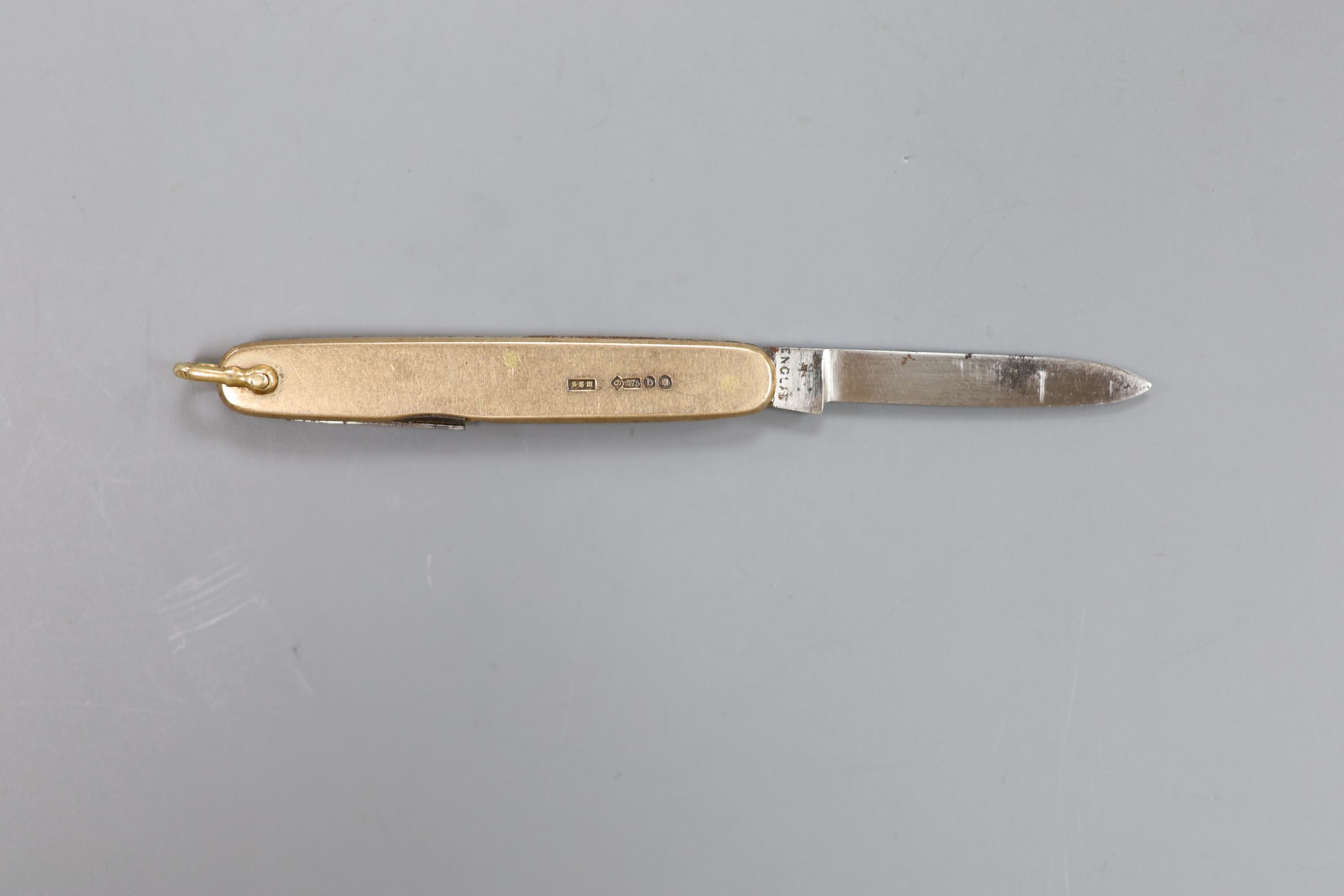 A late Victorian 9ct gold mounted pocket knife, 57mm, gross 15.2 grams.